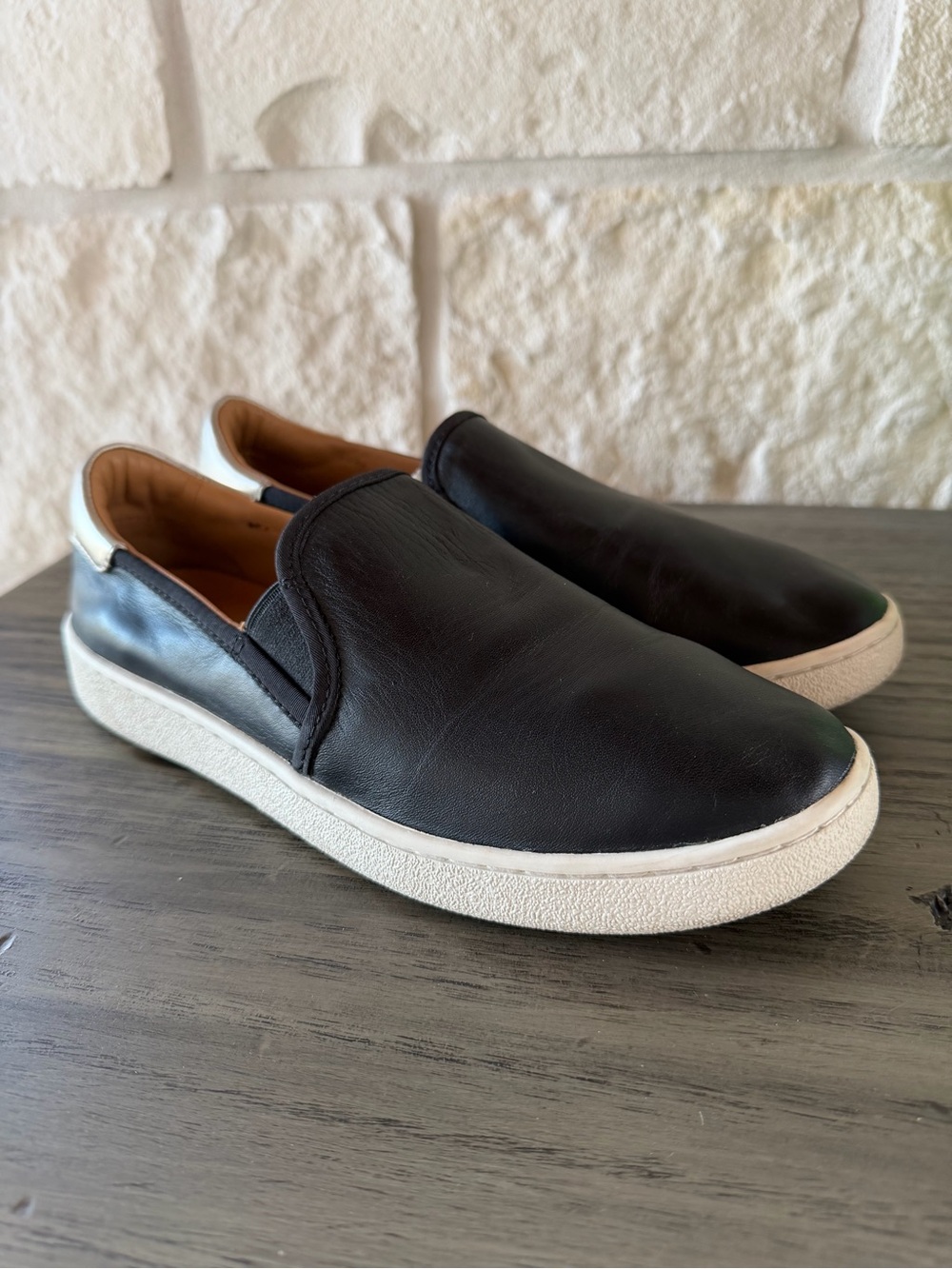 UGG Black Leather Slip On Sneakers Silver Heel Women’s Size 7.5
